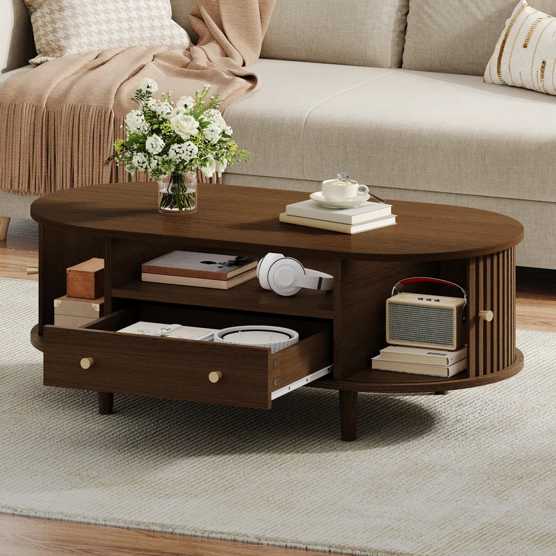 Table basse ovale vintage effet noyer avec tiroir et porte coulissante 100x50x36 cm RIFTKRYNNATHYN