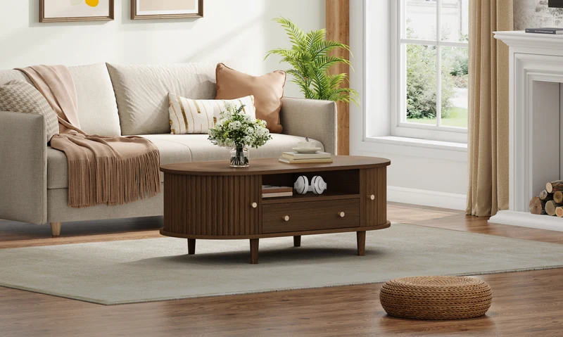 Table basse ovale vintage effet noyer avec tiroir et porte coulissante 100x50x36 cm RIFTKRYNNATHYN