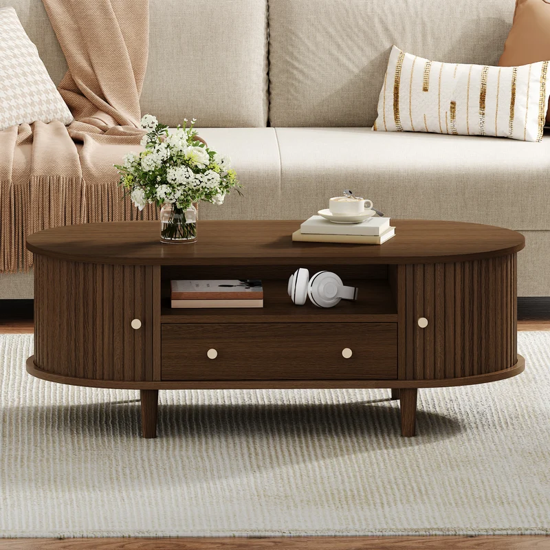 Table basse ovale vintage effet noyer avec tiroir et porte coulissante 100x50x36 cm RIFTKRYNNATHYN
