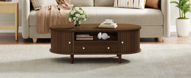 Table basse ovale vintage effet noyer avec tiroir et porte coulissante 100x50x36 cm RIFTKRYNNATHYN