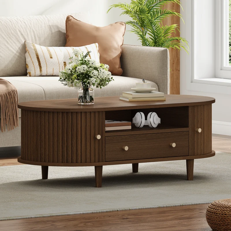 Table basse ovale vintage effet noyer avec tiroir et porte coulissante 100x50x36 cm RIFTKRYNNATHYN