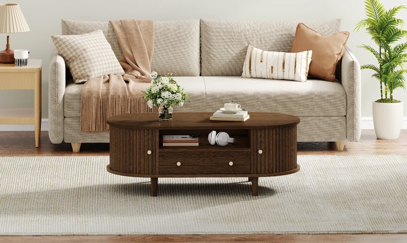 Table basse ovale vintage effet noyer avec tiroir et porte coulissante 100x50x36 cm RIFTKRYNNATHYN