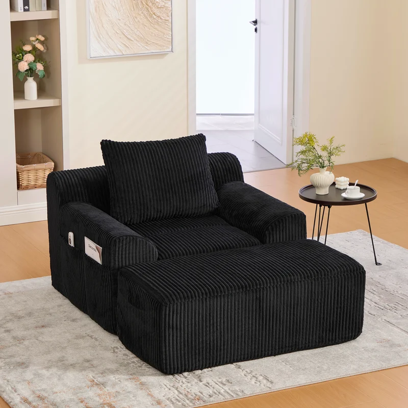 Canapé simple fauteuil XXL en velours côtelé noir, dossier profond, repose pied, coussin & poches latérales, sans montage CHROMONET