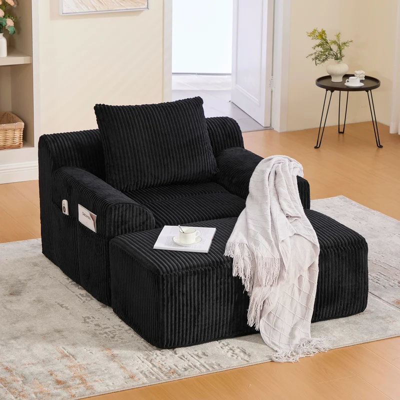Canapé simple fauteuil XXL en velours côtelé noir, dossier profond, repose pied, coussin & poches latérales, sans montage CHROMONET