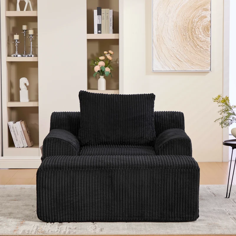 Canapé simple fauteuil XXL en velours côtelé noir, dossier profond, repose pied, coussin & poches latérales, sans montage CHROMONET
