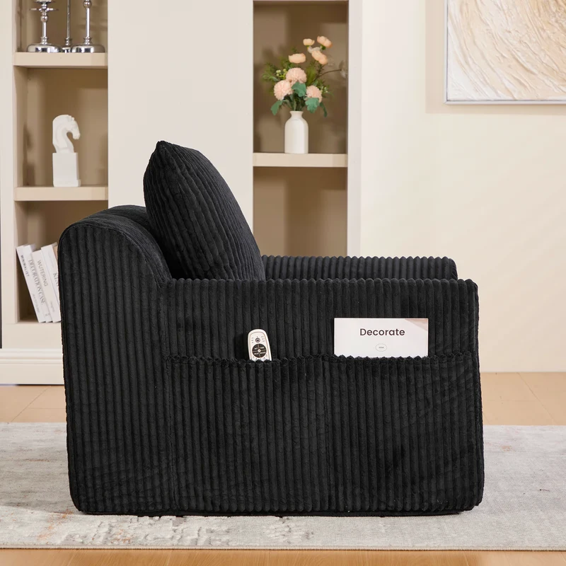 Canapé simple fauteuil XXL en velours côtelé noir, dossier profond, repose pied, coussin & poches latérales, sans montage CHROMONET