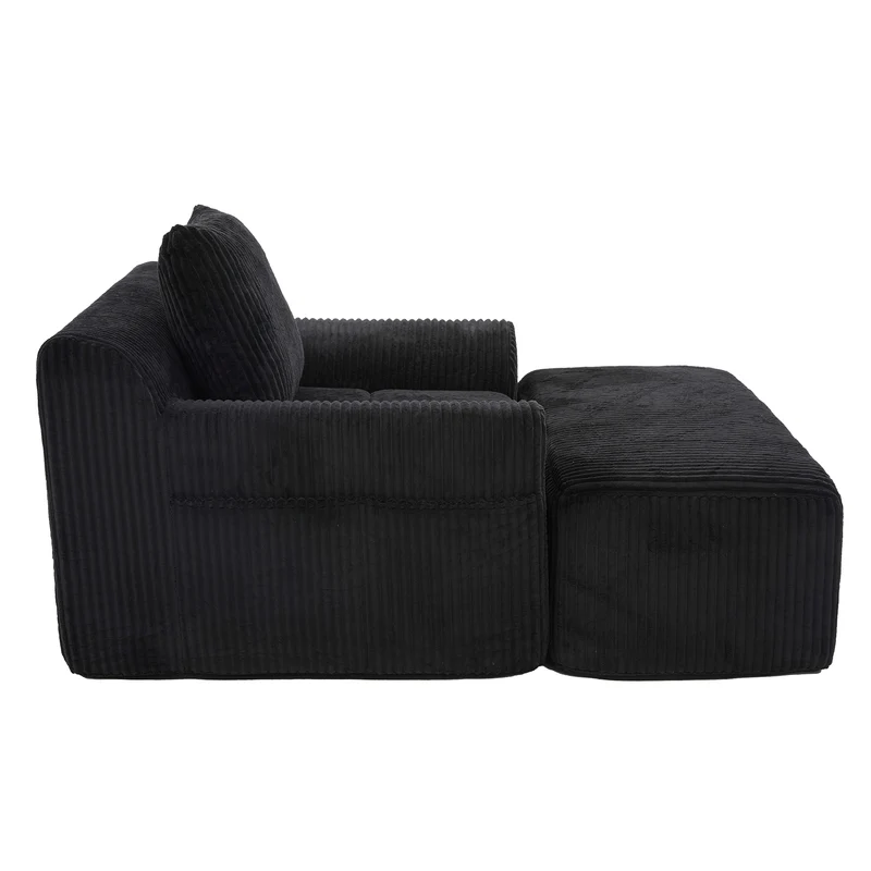 Canapé simple fauteuil XXL en velours côtelé noir, dossier profond, repose pied, coussin & poches latérales, sans montage CHROMONET