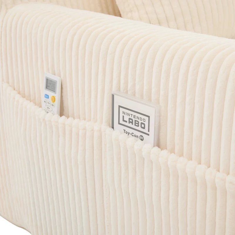 Canapé simple fauteuil XXL en velours côtelé blanc, dossier profond, repose pied, coussin & poches latérales, sans montage TRONACRYSTAL