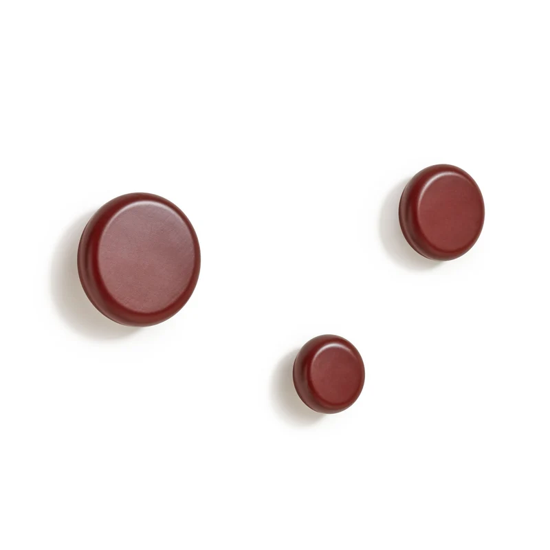 Nadue set of 3 solid beech wood wall hooks with a maroon finish