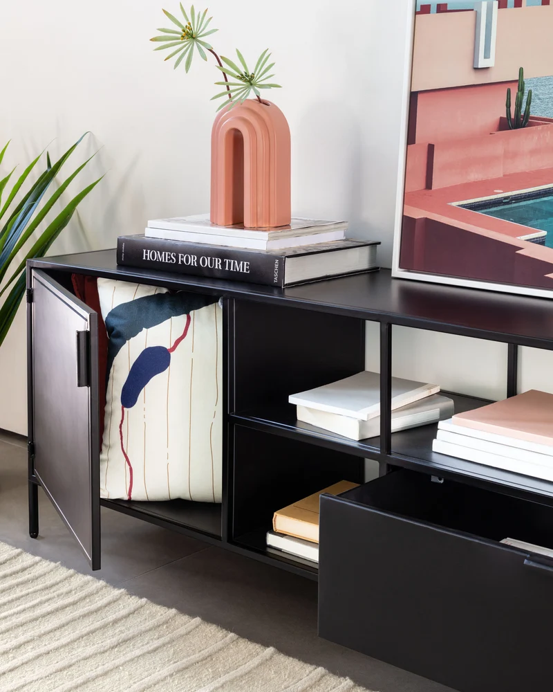 Shantay metal TV stand in a painted black finish with 1 door and drawer, 150 x 50 cm