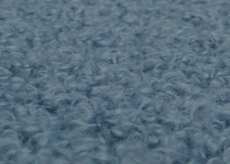 Fauteuil lounge dossier enveloppant et design arrondi en tissu bouclé bleu avec pieds métal 04_0009483