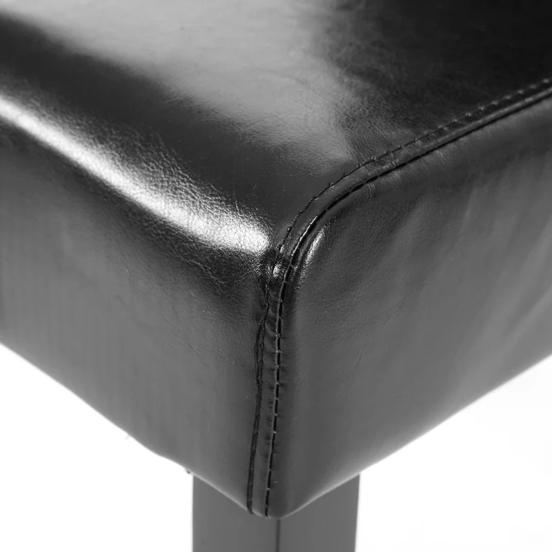 Lot de 4 chaises de salle à manger en synthétique noir pieds en bois foncé CDS04546